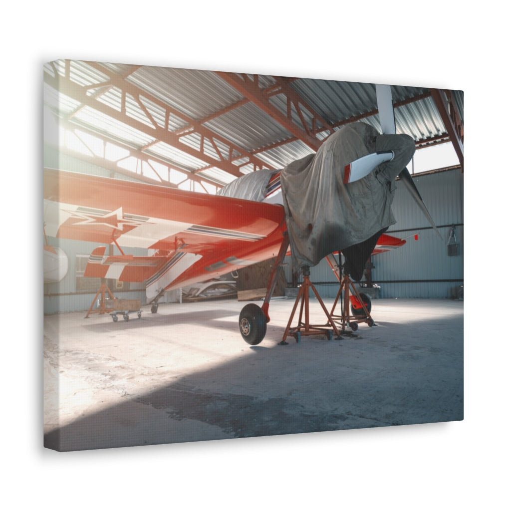 Airplane in Garage Canvas Wall Art